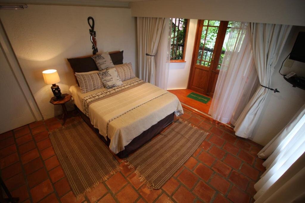 Acra-Retreat Mountain View Lodge - guest room
